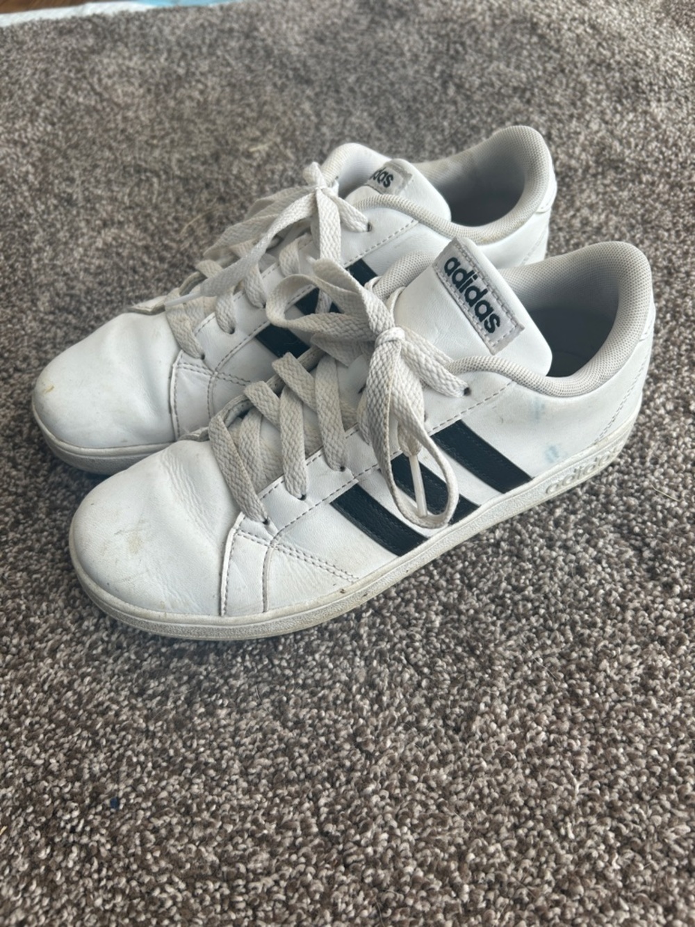 Kid’s Adidas Size 4 White Sneakers with Black Stripes water resistant coating